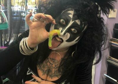 Person dressed as a member of the band Kiss.